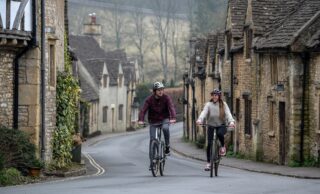 Couple riding Marin Kentfield hybrid bikes, UK.