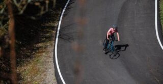 Marin Fairfax 2 ST rider riding on an open expanse of pavement, Wales UK.