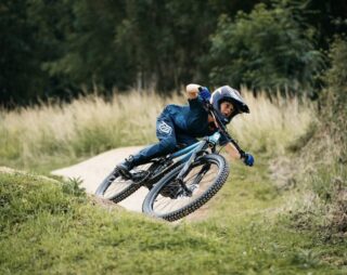 Rift Zone 26 rider, in a berm, UK.