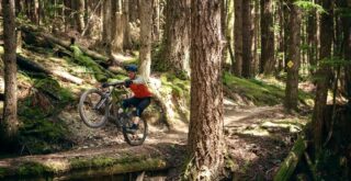 Marin ambassador Brendan Carberry manualling on a trail in British Columbia.