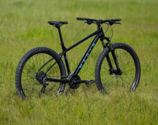 Rear 3/4 image of Marin Bolinas Ridge 2 in a grassy field.