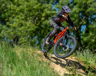 Red Marin Bikes San Quentin jumping at 417 Project