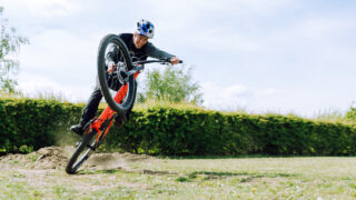 matt jones manualling out of a corner in a field on hardtail