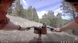 Point-of-view shot of a rider on a Marin Larkspur 2 riding on a trail.